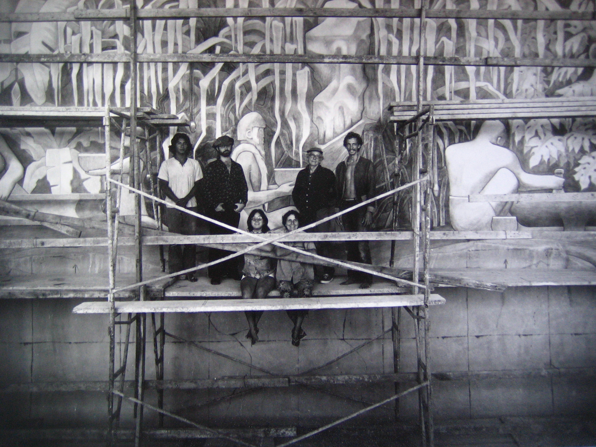 Execution of mural.  The Relation of Man and Nature in Old Hawaiʻi.  Jean Charlot.  1974.  Six people, Jean Charlot second from rightside of platform.